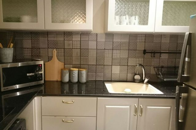 A fitted kitchen in one of the two-bedroom apartments
