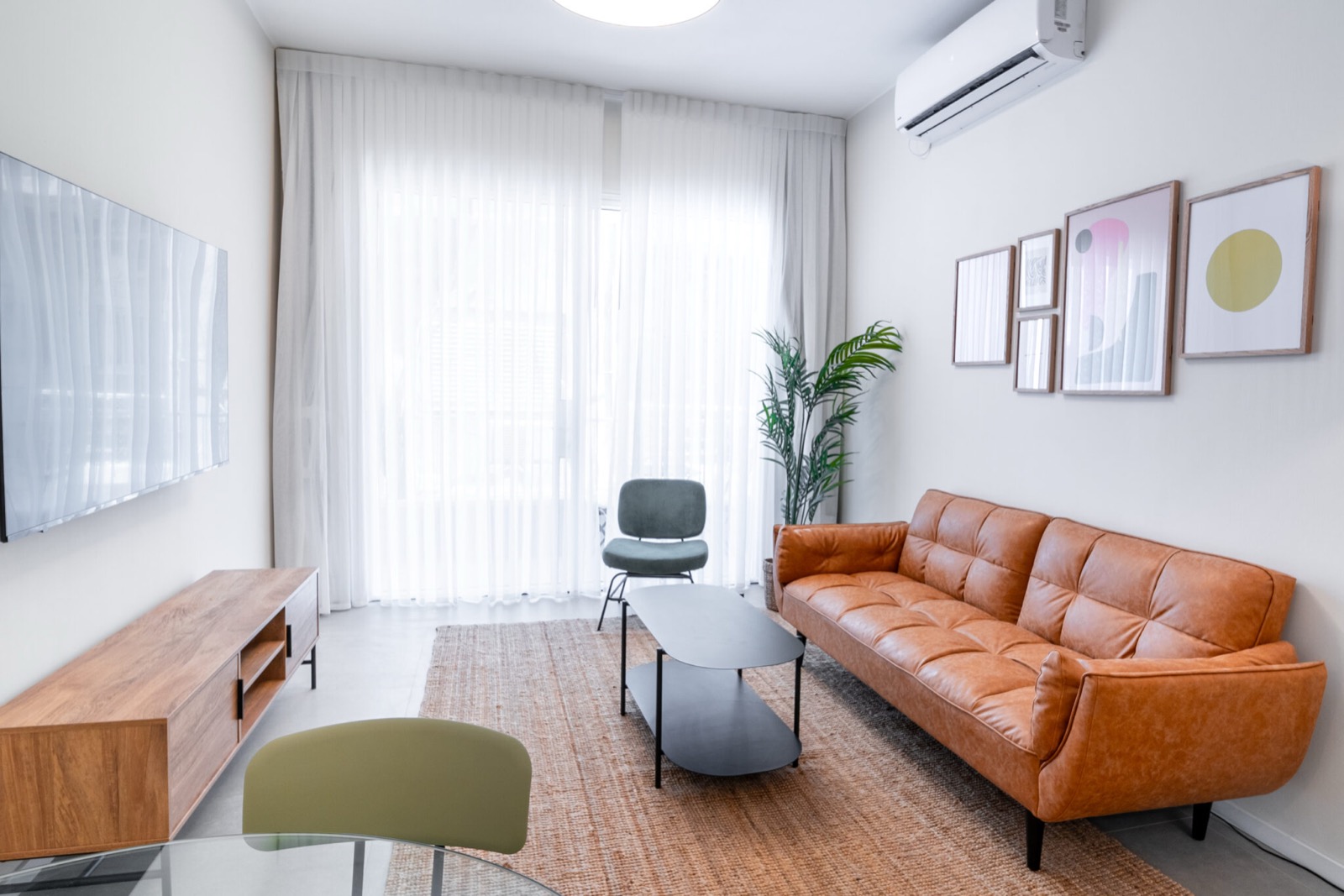 A bright living room in one of the apartments