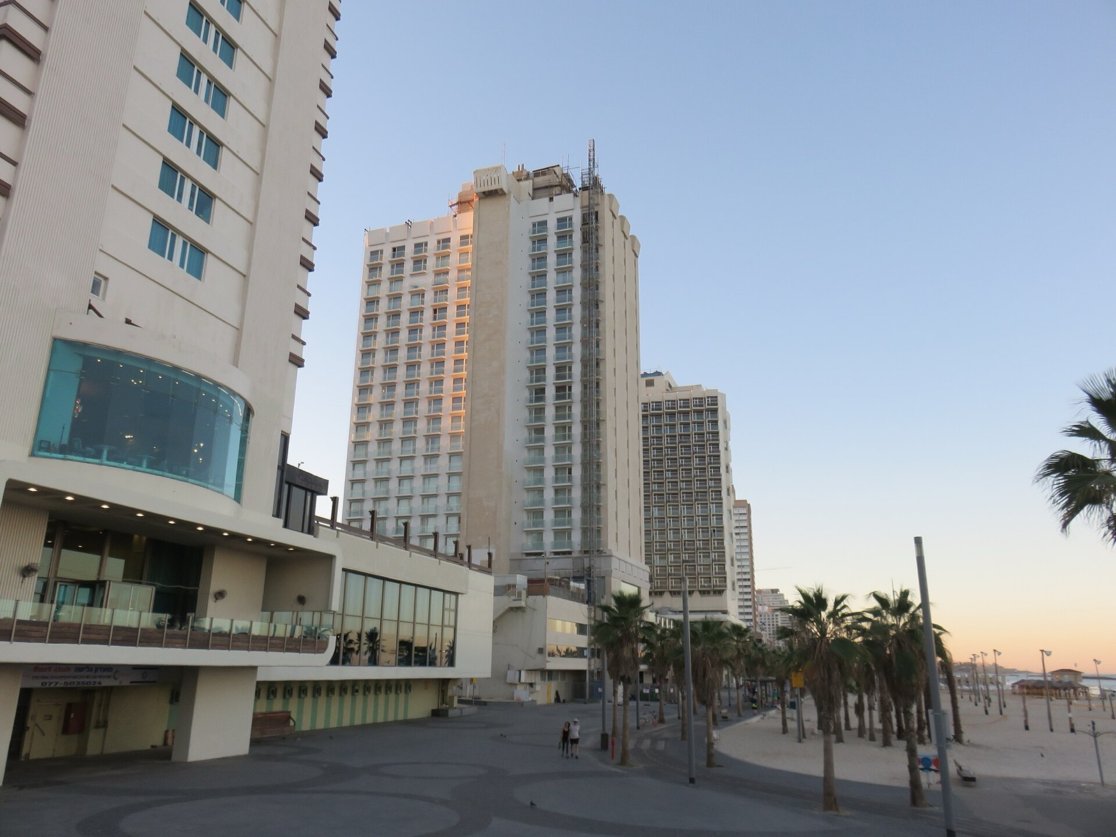 The Tel Aviv seafront promenade with the hotel towers behind