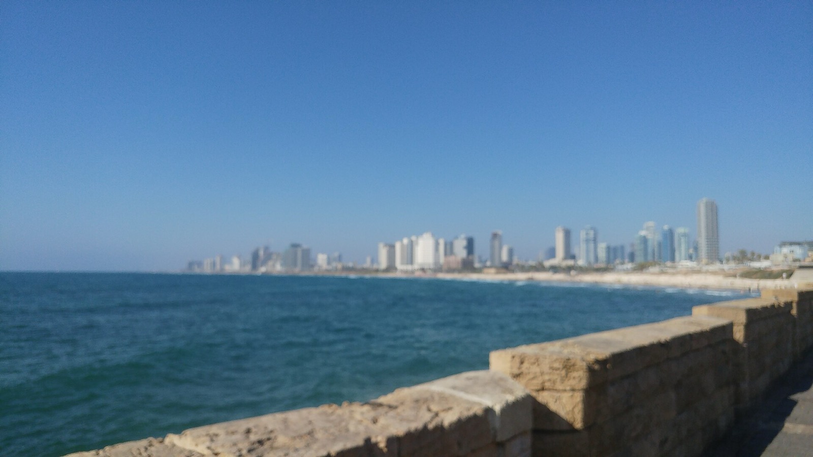 The view north from Jaffa's sea wall towards the Tel Aviv skyline